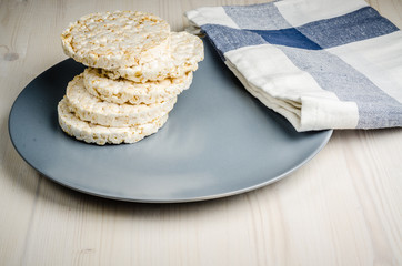 rice cake, puffed rice on table cloth.