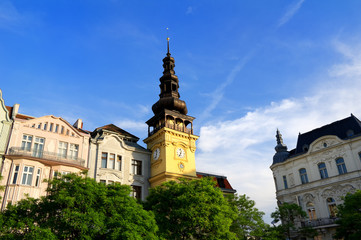 Old town hall (Stara radnice), Masaryk square (Masarykovo namesti), Ostrava, Czech republic / Czechia - facade of beautiful building with baroque spire. Sunny summer sunset.