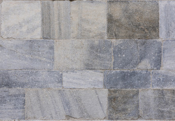 Marble Church Wall: Gray, pink and white colored marble wall blocks of the late Gothic Duomo di Como in Como, Italy