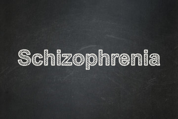 Obraz premium Healthcare concept: Schizophrenia on chalkboard background