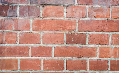 Background of old vintage brick wall / Abstract weathered texture stained old stucco light gray / Industrial background, empty grunge urban street with warehouse