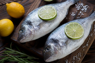 Close-up of raw fresh dorado fish, selective focus