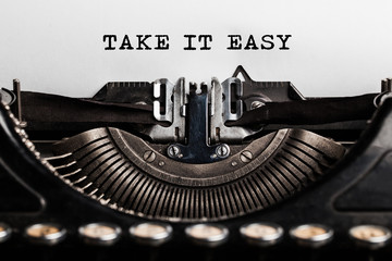 take it easy slogan writen by a typewriter