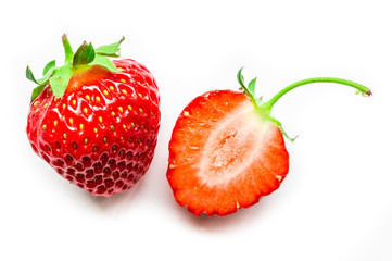 One half and one whole of fresh and ripe strawberry isolated