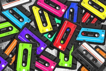Old audio cassette. Multicolored audio tapes. Close-up view. The concept of old music. The era of retro songs. Isolated objects. large collection of retro cassette tapes. The music of yesteryear.