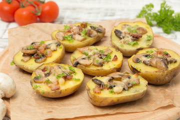 baked potato with mushrooms and bacon with cheese.