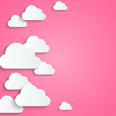 Paper clouds on pink background