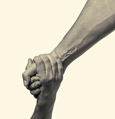 helping hand outstretched for salvation  on isolated toned background
