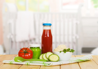Tomato juice, vegetable soup with cauliflower, zucchini on  background   kitchen.