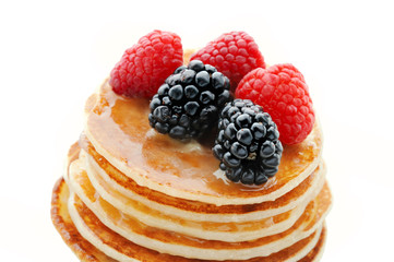 Healthy Breakfast.Pancakes with berries and honey.