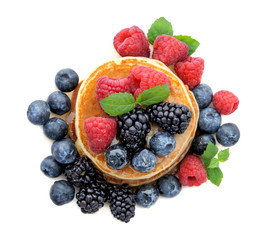 Healthy Breakfast.Pancakes with berries and honey.