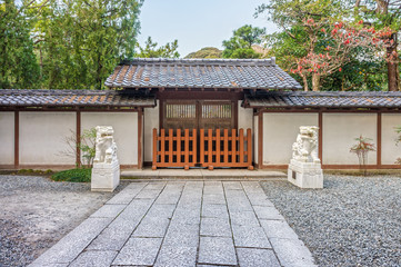 The entrance gate with lion sculptures of  the Kotoku-in Temple. The temple is located in Kamakura, Kanagawa Prefecture, Japan.