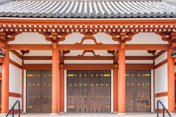 Fotobehang Tempel De deuringang van de boeddhistische pagode bij de Senso-ji-tempel in Tokio. De constructie toont de oude structuur van het Japanse boeddhisme.