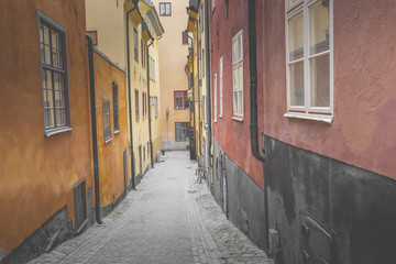 Fototapeta na wymiar Narrow Street in Old Town (Gamla Stan) of Stockholm, Sweden