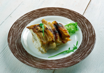 Baked cod wrapped in bacon