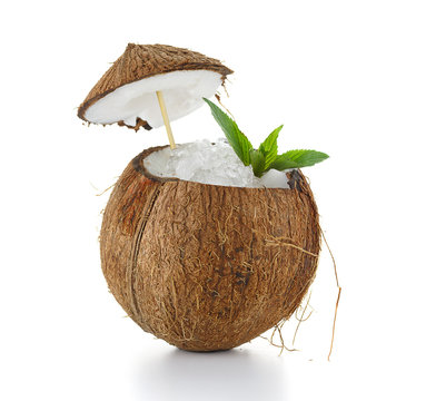 Coconut cocktail with ice isolated on white background