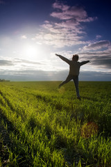 outdoor jump on sunset background