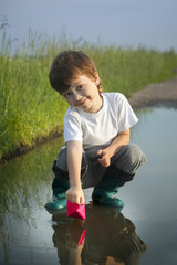 boy play in puddle