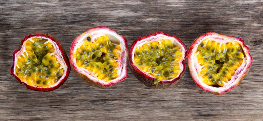 Ripe passion fruit on wooden table background