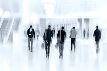 group of people in the lobby business center and blue tonality