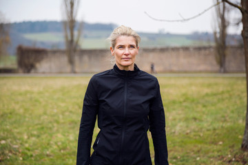 attractive and healthy woman after a run in the park