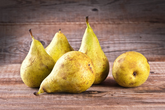 Pears on wooden table