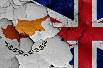 flags of Cyprus and UK painted on cracked wall