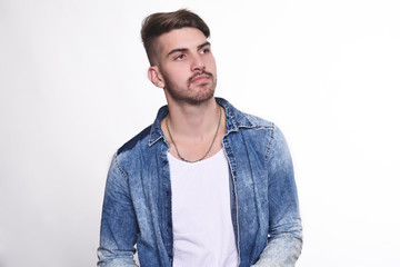 Young man against isolated white background