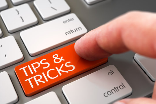 Tips & Tricks - Aluminum Keyboard Concept. Tips & Tricks - Metallic Keyboard Key. Hand Touching Tips & Tricks Button. Hand Finger Press Tips & Tricks Key. 3D.