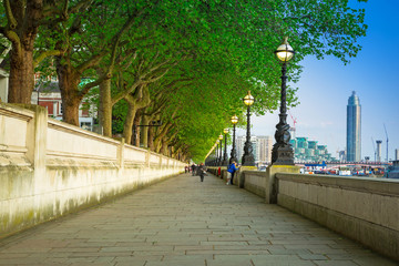 Alley at the Thames river in London at dusk, UK