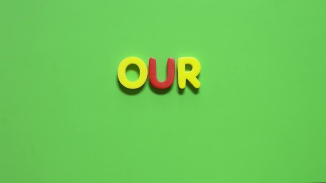 man lays out to the inscription from colored letters