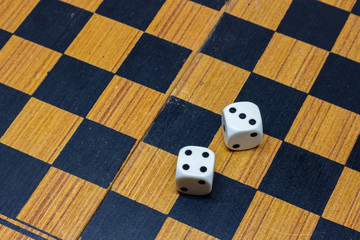 Two dice on chess board