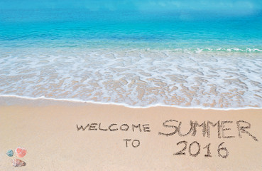 welcome to summer 2016 written on a tropical beach