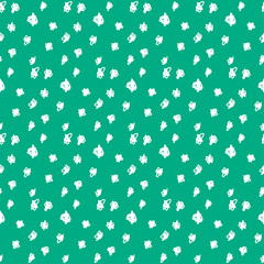 Doodle seamless pattern background. Hand drawn circles isolated on green