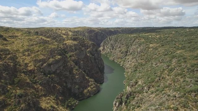 Aerial view approaching the edge of a cliff