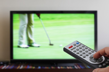 Zapping tv during golf