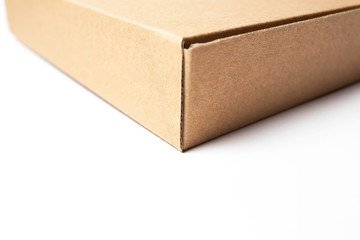 Brown carton cardboard package box isolated white.