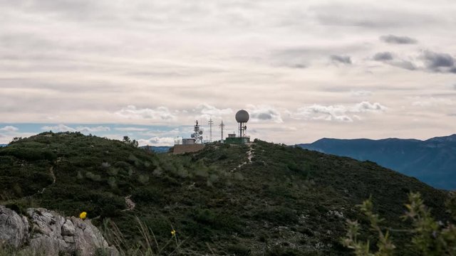 Radar and antenna over mountain time-lapse, 4k