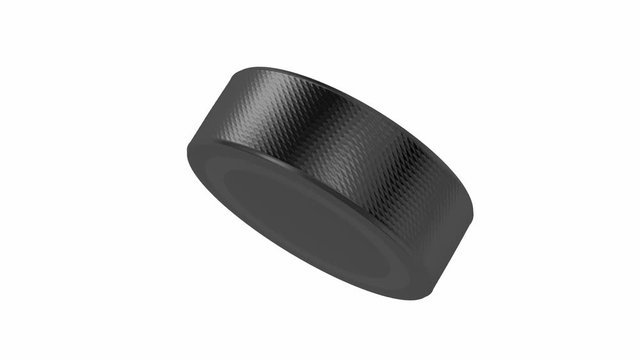 Ice hockey puck spin on white background