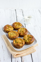 Zucchini muffins with herbs