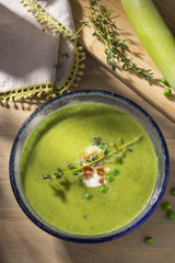 Bowl of Spring Pea Soup with Ingredients