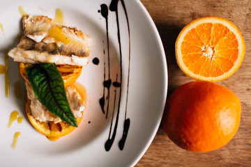 fillet of fish on an orange