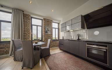Contemporary interior studio, kitchen, lounge. Modern interior in private house.