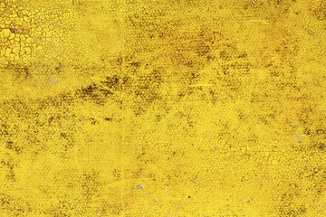 Yellow and dirty cracked paint surface