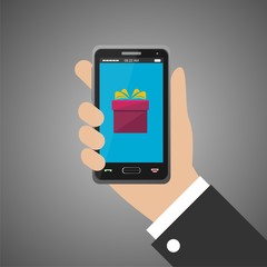 Hand holding smartphone with gift icon