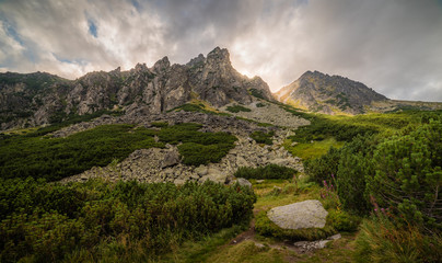 Fototapeta premium Mountain Landscape with Dramatic Glowing Sky. Mlynicka Valley, High Tatra, Slovakia.