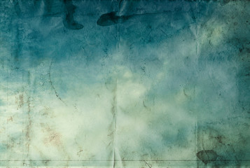 Blue cloth with coffee stains background