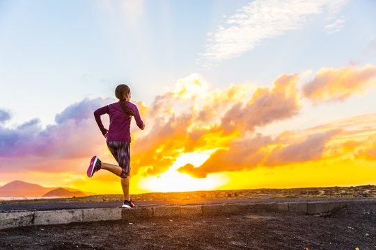 Athlete Trail Running Silhouette Of A Female Runner On Sunset Road Sunrise. Cardio Fitness Woman Training For Marathon Race. Active Healthy Lifestyle In Summer Nature Outdoors. Life Challenge Concept.