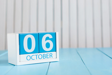October 6th. Image of October 6 wooden color calendar on white background. Autumn day. Empty space for text