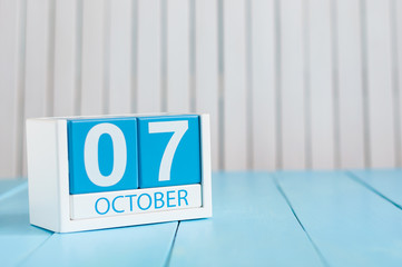 October 7th. Image of October 7 wooden color calendar on white background. Autumn day. Empty space for text